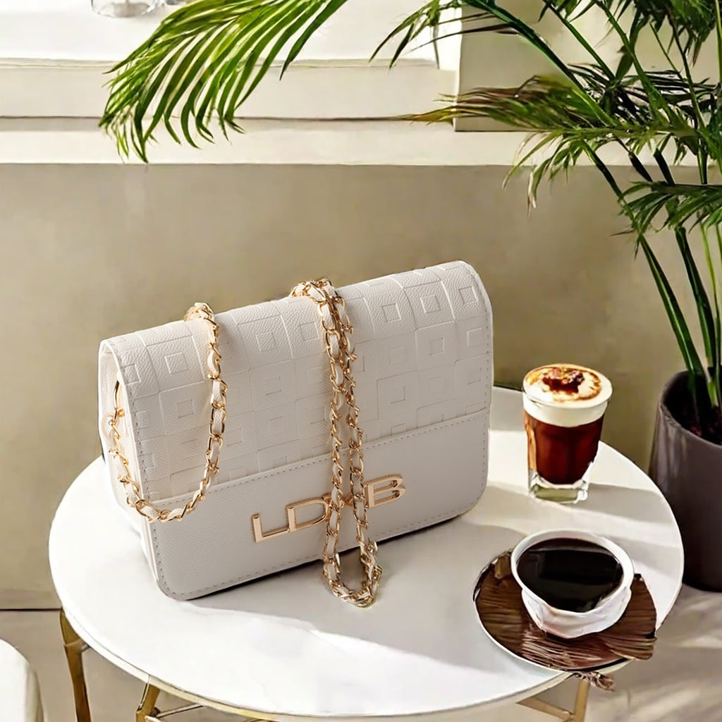 Elevate Your Style with the TMA EYES Women's Vintage Floral Small Square Crossbody Chain Shoulder Bag